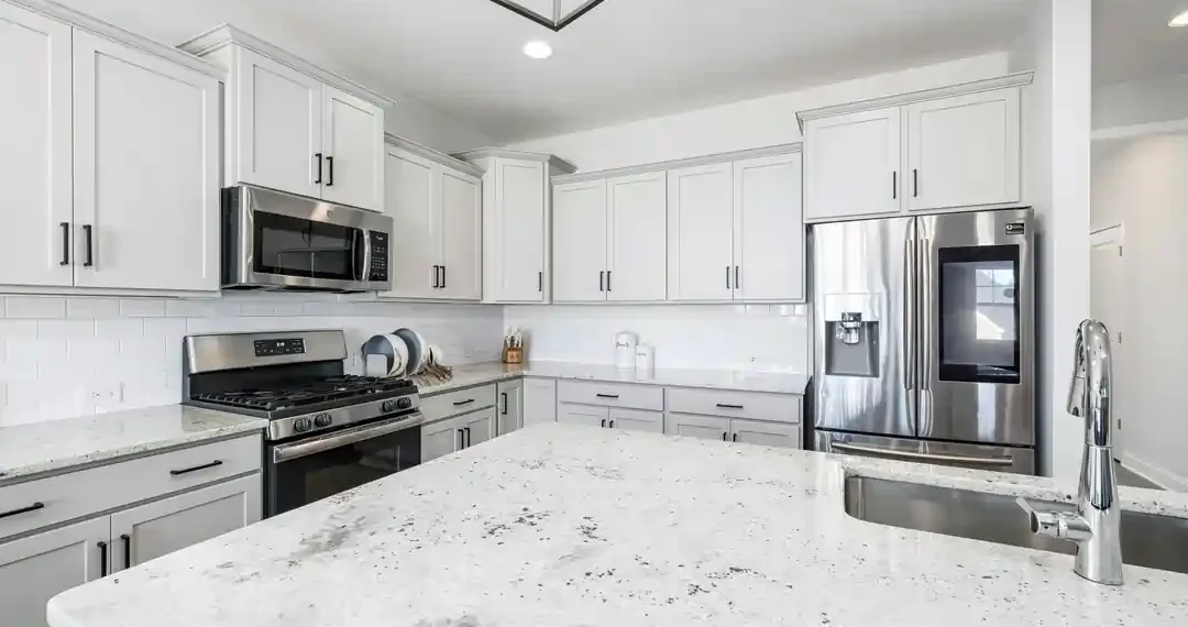 The Art of Combining Quartzite Countertops with Marble Backsplashes